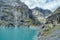 View of the Limmernsee dam in the canton of Glarus. Hiking high above the mountain lake in the Alps. Glarus, Switzerland