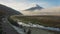 View of Limpiopungo lagoon with volcano Cotopaxi in the background on a cloudy morning