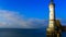 View of Lindau Lighthouse with sea and blue sky background