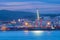 View of Lisbon port with ship and port cranes in the evening