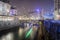 View of Ljubljana city at night, Slovenia from concrete river bank