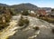 A view from the Llangollen Bridge towards the old railway station in Llangollen, Wales with a train at the station