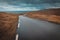 View of a lonely and winding road in the Faroe Islands