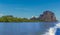 A view from a longtailed speed boat of mangrove swamps and limestone islands lining the channels leading to Phang Nga Bay in