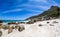 A view looking up at table mountain from the beautiful white sand beach of clifton in the capetown area of south africa.2