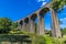 A view looking up towards the Thornton viaduct next to the town of Thornton, Yorkshire, UK