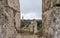 View through the loophole in the city fortress wall at the city walls near the Jaffa Gate in old city of Jerusalem, Israel