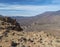 View on Los Roques de Garcia rock formation and slope of colorful volcano Pico del Teide from from top of Alto de