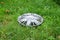 View of lost hubcap on the grass