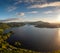 View of Lough Caragh lake in the Glencar Valley of Kerry County in warm eveing light