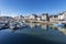 View of  Lules Sandeau Quay and boats moored in the port of Le Pouliguen Channel in La Baule, the seaside resort in Southern