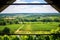 view of lush vineyard from high turret or tower
