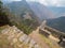 View of Machu Picchu from the top of Waynapicchu mountain, stone walls on ancient Inca construction