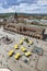 View of Main Market Square in Krakow, other historic buildings, commercial properties and people