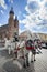 View of Main Market Square in Krakow, other historic buildings, commercial properties and people