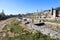 View of main street with collonade and water canal of ancient ruined city Perge, near Antalya, Turkey