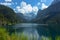 View of majestic mountains and lake.Nature getaway. Turquoise water of Gosau See,lake,Austria,Dachstein glacier in background.