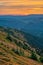 View from Mala Chochula mountain during autumn with orange coloured sky after sunset