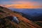 View from Mala Chochula mountain during autumn with orange coloured sky after sunset