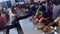 View of male students eating food together in the school canteen