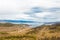 View of the Maloe More Strait, Curkut Bay and tourist centers on the shore. September. Lake Baikal, Russia.