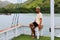 view of a man enjoying on the sailing traditional phinisi in Labuan Bajo