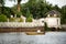 View of man in small dinghy fishing