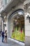 View of man and woman in front of famous, French luxury brand`s store on street called