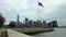 View of Manhattan, New York, USA. American flag