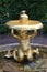 View of the Manneken Pis fountain holding a tray with a jug in the Lower Park in Petergof