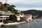 View of mansions by Bosphorus in Kandilli area of Asian side of Istanbul. It is a sunny summer day.