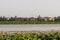 View of the Mantova skyline in Italy as viewed from the upper lake on a cloudy day