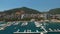 View of the marinas against the background of modern buildings on the coast of Budva