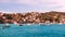 View on marine in Bosporus Strait with boats and ships before hilly residential blocks of Bebek neighborhood behind