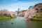 View of massive cherry blossom tree with poeple oar kayak boat in Tokyo, Japan as background. Photoed at Chidorigafuchi, Tokyo,