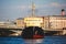 View of a Massive russian nuclear-powered icebreaker, diesel-powered ice-breaker ship in a port harbor, summer sunny day