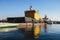 View of a Massive russian nuclear-powered icebreaker, diesel-powered ice-breaker ship in a port harbor, summer sunny day