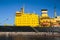 View of a Massive russian nuclear-powered icebreaker, diesel-powered ice-breaker ship in a port harbor, summer sunny day