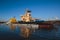 View of a Massive russian nuclear-powered icebreaker, diesel-powered ice-breaker ship in a port harbor, summer sunny day