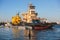 View of a Massive russian nuclear-powered icebreaker, diesel-powered ice-breaker ship in a port harbor, summer sunny day