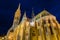 View of the Matthias Church during blue hour, roman catholic church located in Budapest, Hungary inside Fisherman`s Bastion at the