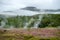 View of a Meadow with Steaming Hot Springs, Haukadalur Valley