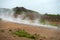 View of a Meadow with Steaming Hot Springs, Haukadalur Valley