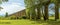 A view from a meadow towards the impressive Nottolini aqueduct in Lucca Italy