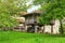 View of a meadow with wooden horreo to store grain in Asturias