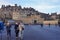 View of the medieval Edinburgh castle front gate with crowd of people walking
