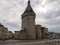 View of medieval fortified tower of port entrance in French city of Libourne