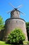 View on medieval historical brick stone tower windmill, blue sky - Kempen, Germany