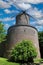 View on medieval historical brick stone tower windmill, blue sky - Kempen, Germany