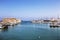 View of the medieval sea fortress Coules and the old port on a sunny summer day. Heraklion, Crete